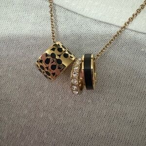Coach Gold and Black Multi-Charm Necklace